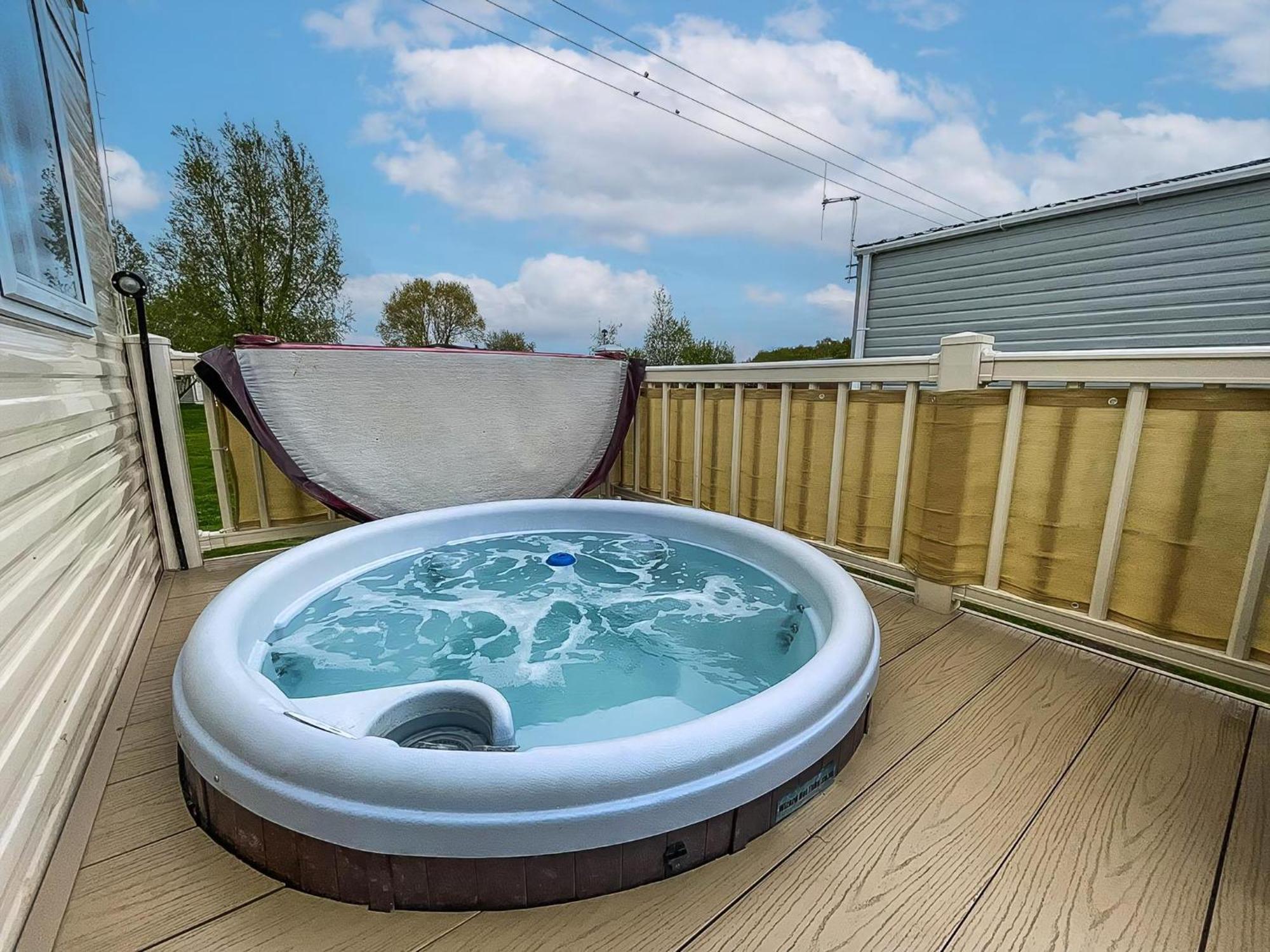 Great Caravan With Large Decking Area And Private Hot Tub, Ref 95016sw